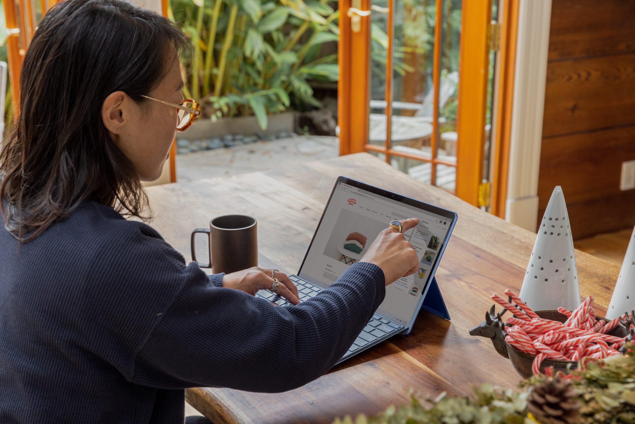 woman working on her iPad.