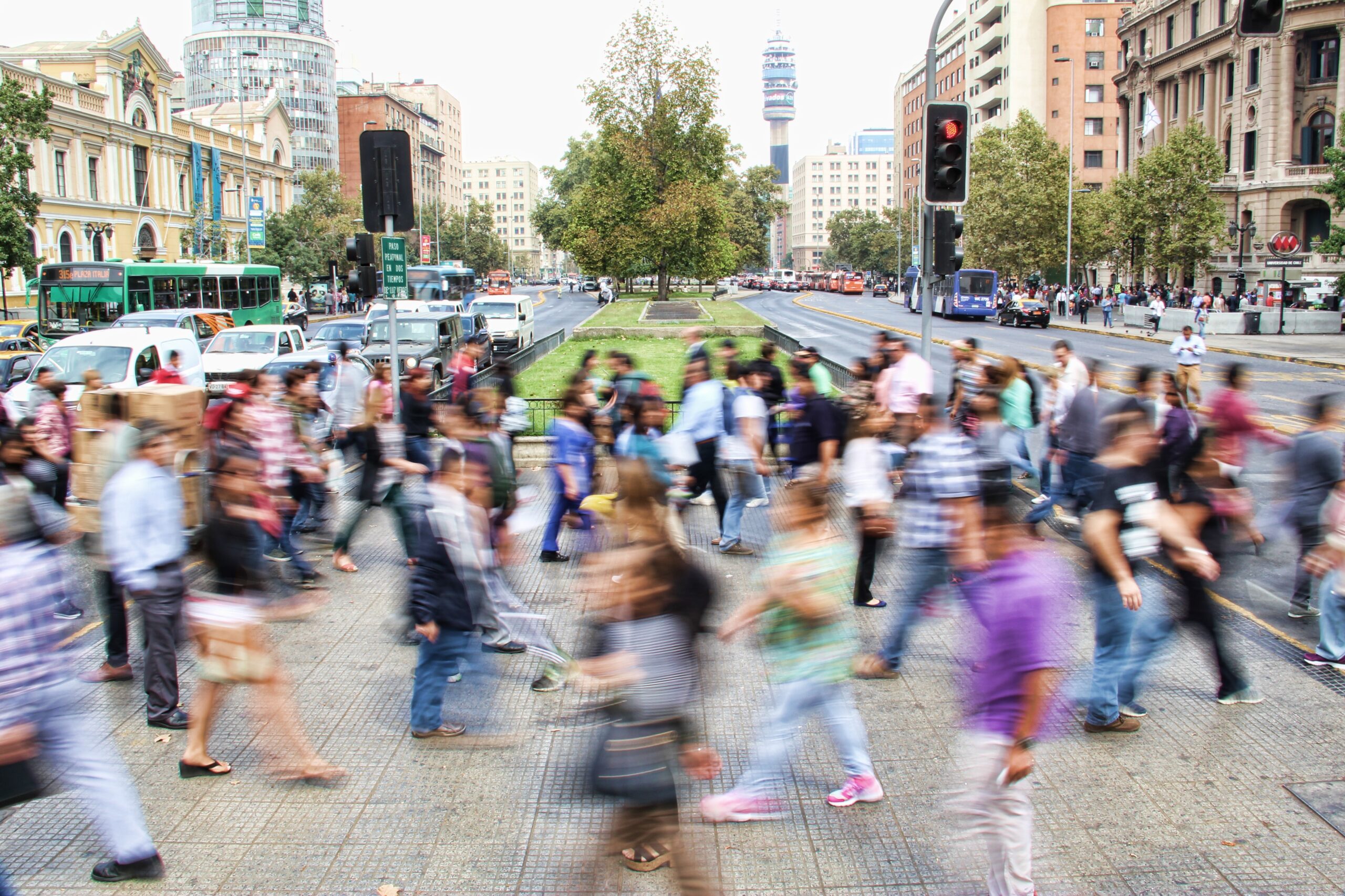 A blurry photo of a crowd of people. This is meant to symbolize discourse in communities.