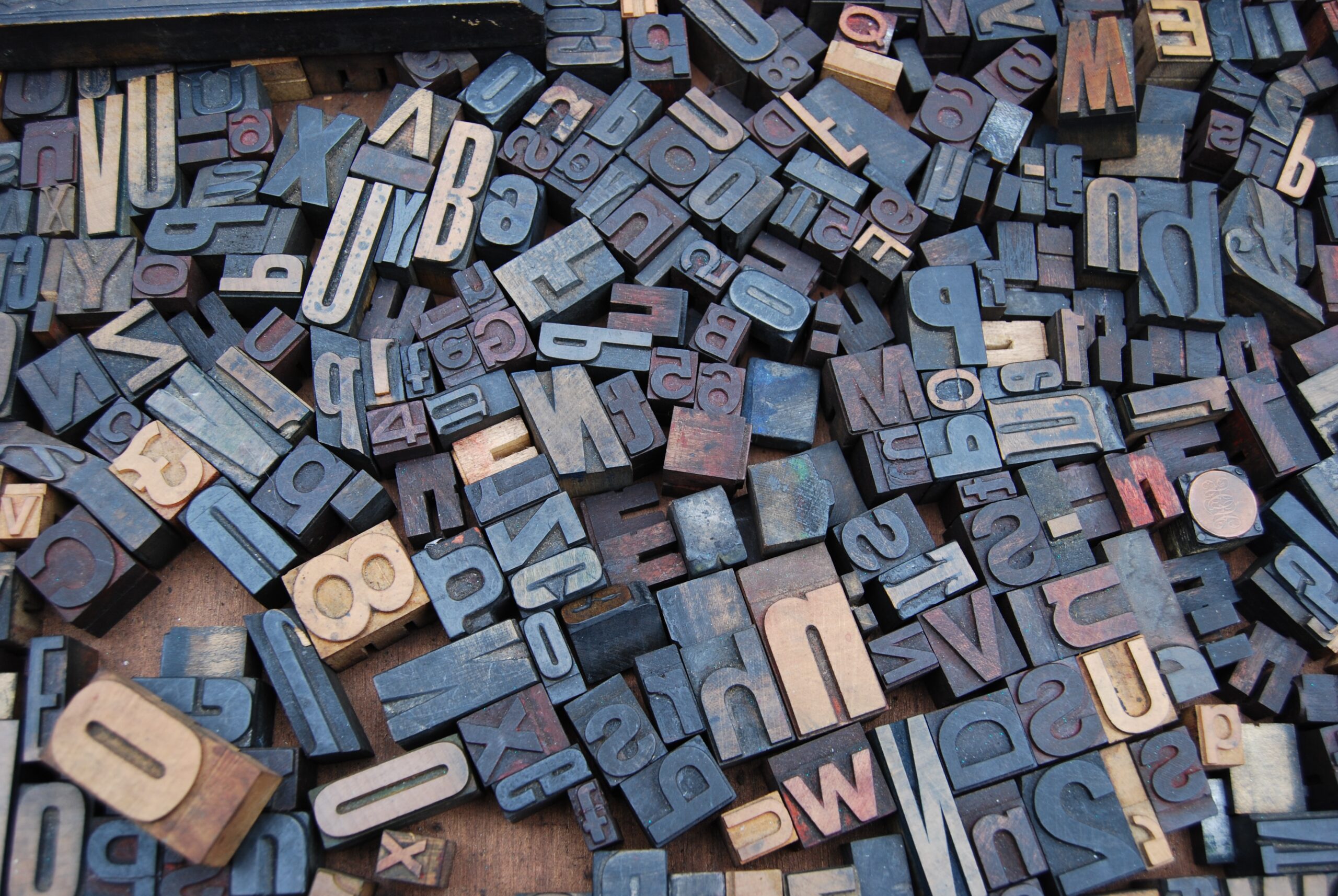 stamp block letters scattered around