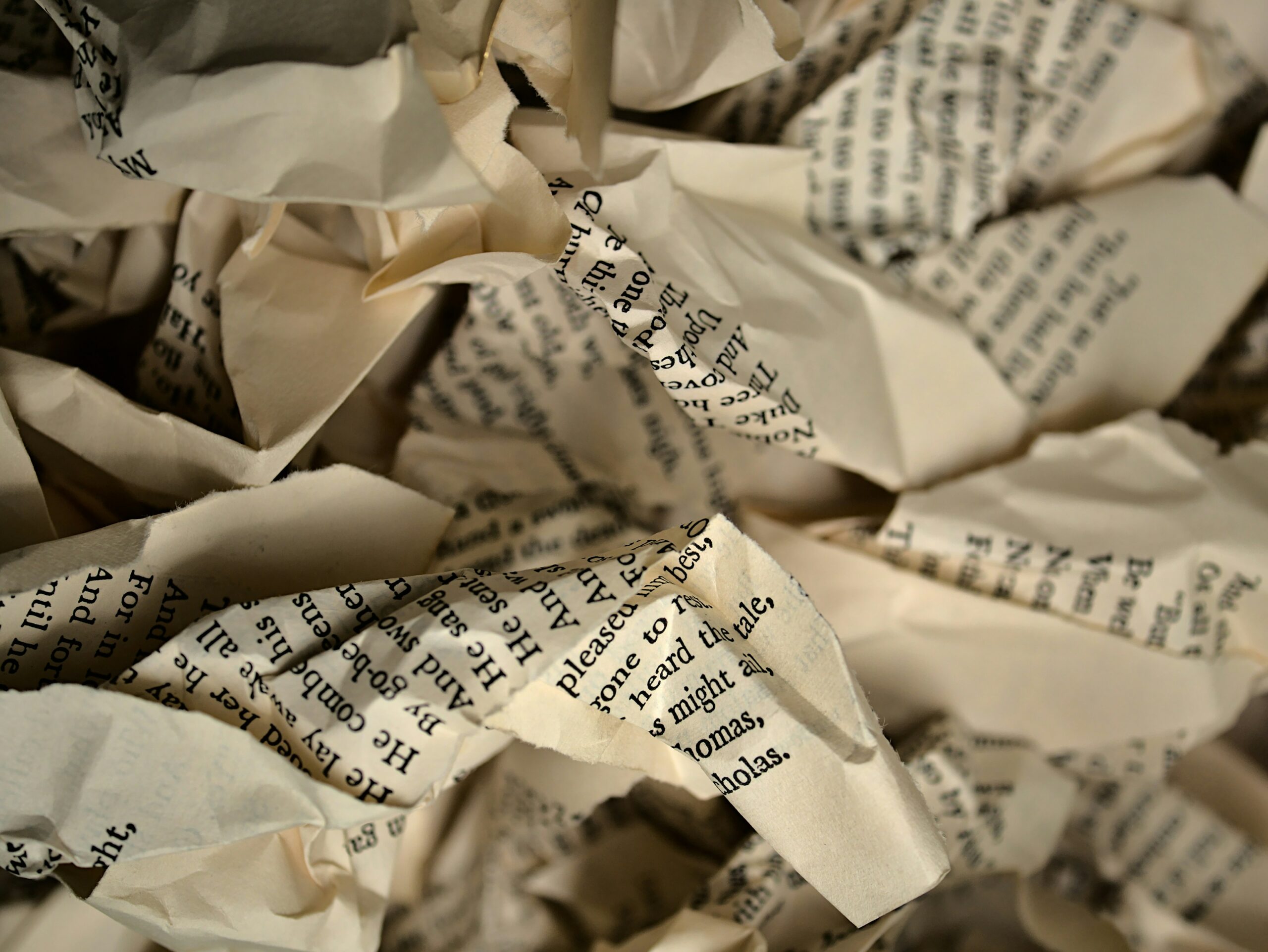 Crumbled pieces of book pages.